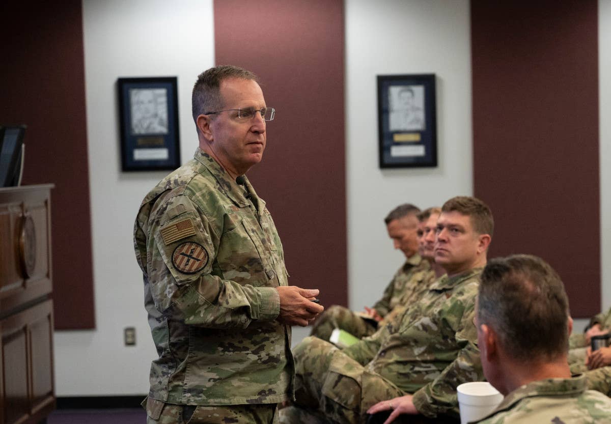 Air Force Lt. Gen. James Slife, then head of Air Force Special Operations Command, speaks to other officers in 2022. <em>USAF</em>