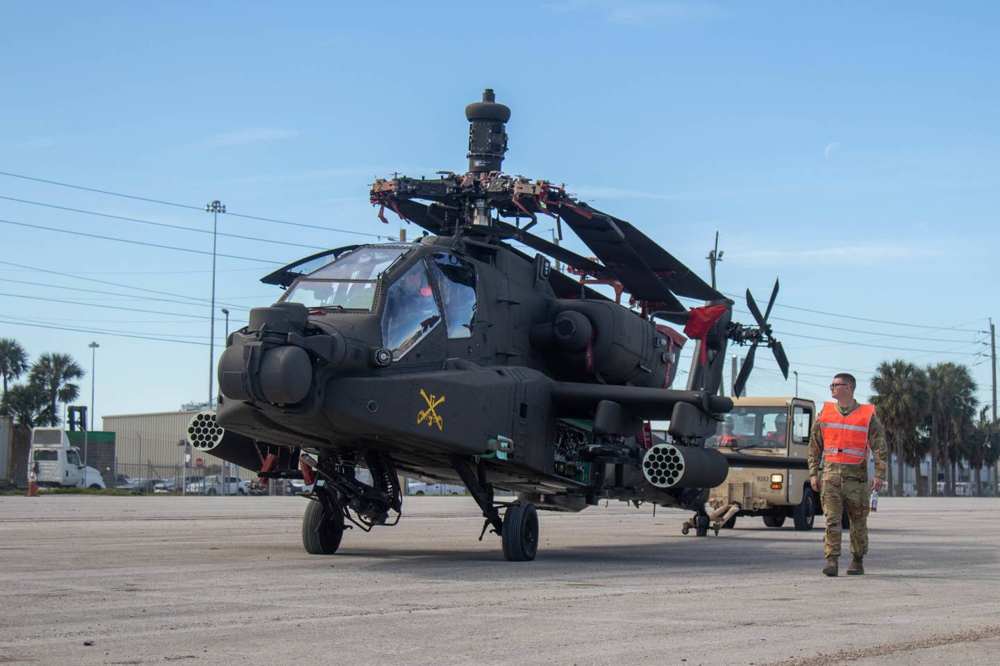 The new rotor mast communications system can be seen in this image of a 3rd Combat Aviation Brigade, 3rd Infantry Division AH-64 Apache. (U.S. Army photo by Sgt Caitlin Wilkins, 3rd Combat Aviation Brigade)