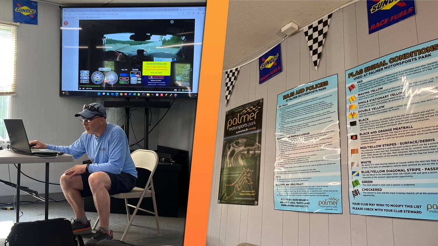 Pro instructors walked us around the track via video. The classroom's decorated with useful info. <em>Andrew P. Collins</em>
