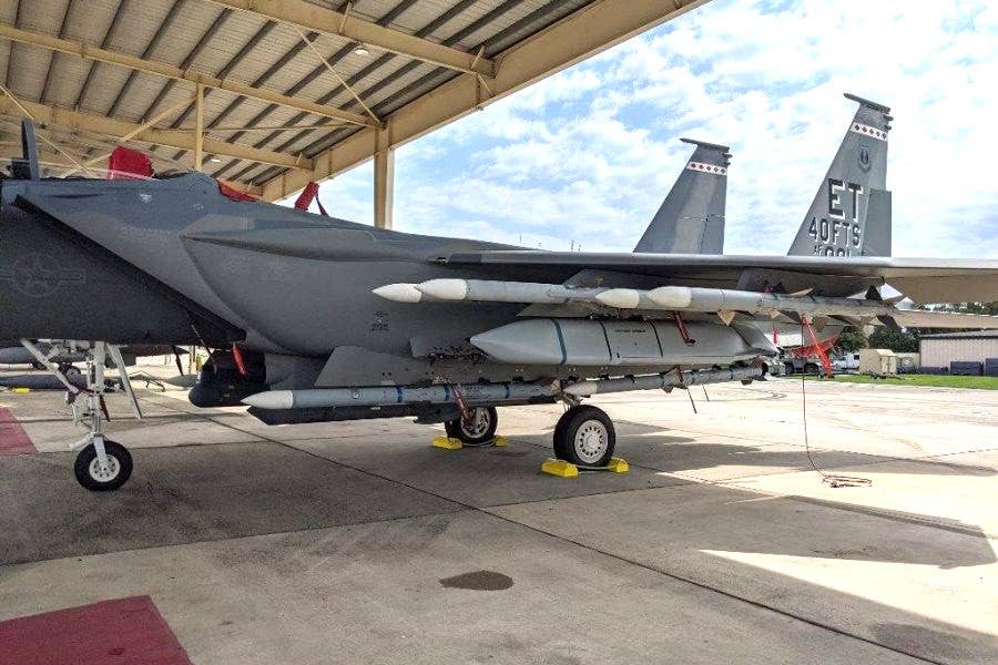 One of the US Air Force's two F-15EXs seen loaded with a mixture of AIM-120 Advanced Medium Range Air-to-Air Missiles (AMRAAM) and AGM-158 Joint Air-to-Surface Standoff Missile (JASSM) cruise missiles. This underscores the aircraft's significant payload capacity. <em>USAF</em>