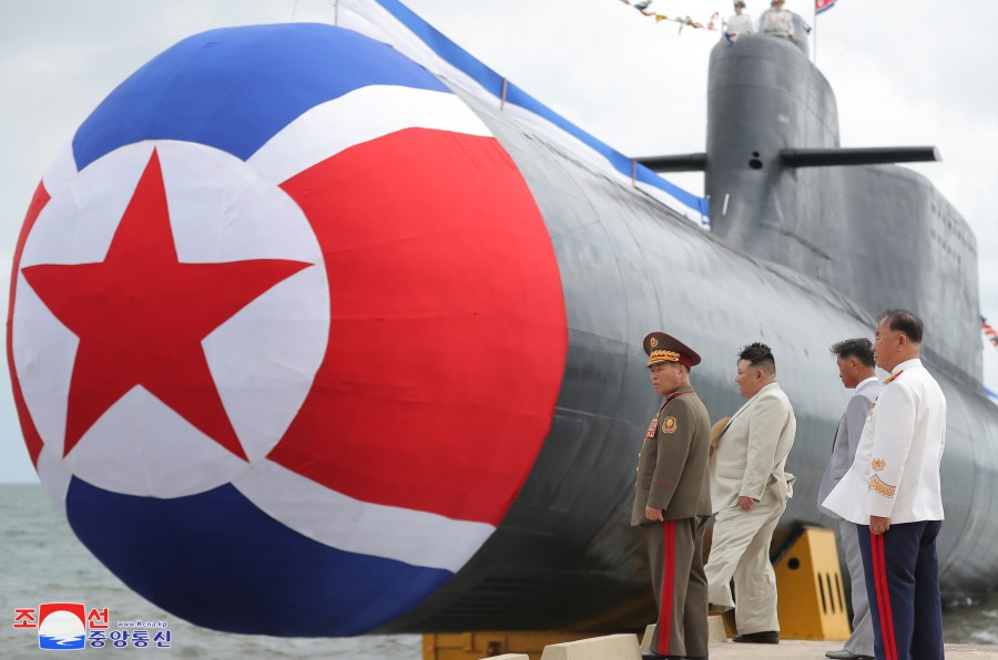 Kim inspects his ballistic missile submarine in Sinpo. (KCNA)