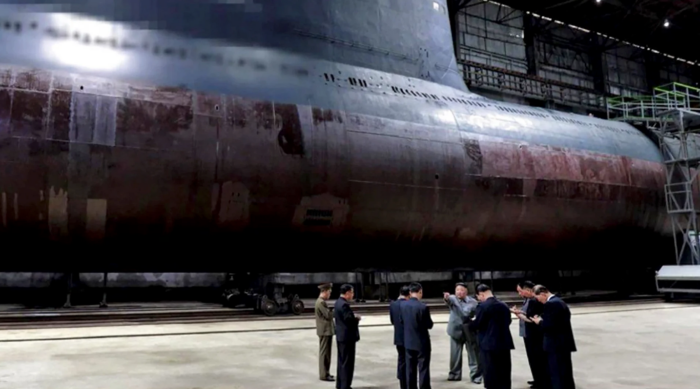 Kim touring the Sinpo submarine yards back in 2019, the first time we got a glimpse of the regime's <em>Romeo</em> class turned SSB 'Frankensub' ambitions. (KCNA)