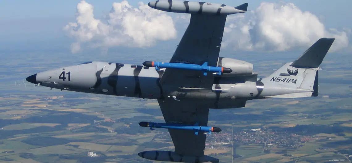 A Learjet 35 belonging to private contractor Phoenix Air packing electronic warfare pods to act as an aggressor. <em>Phoenix Air</em>