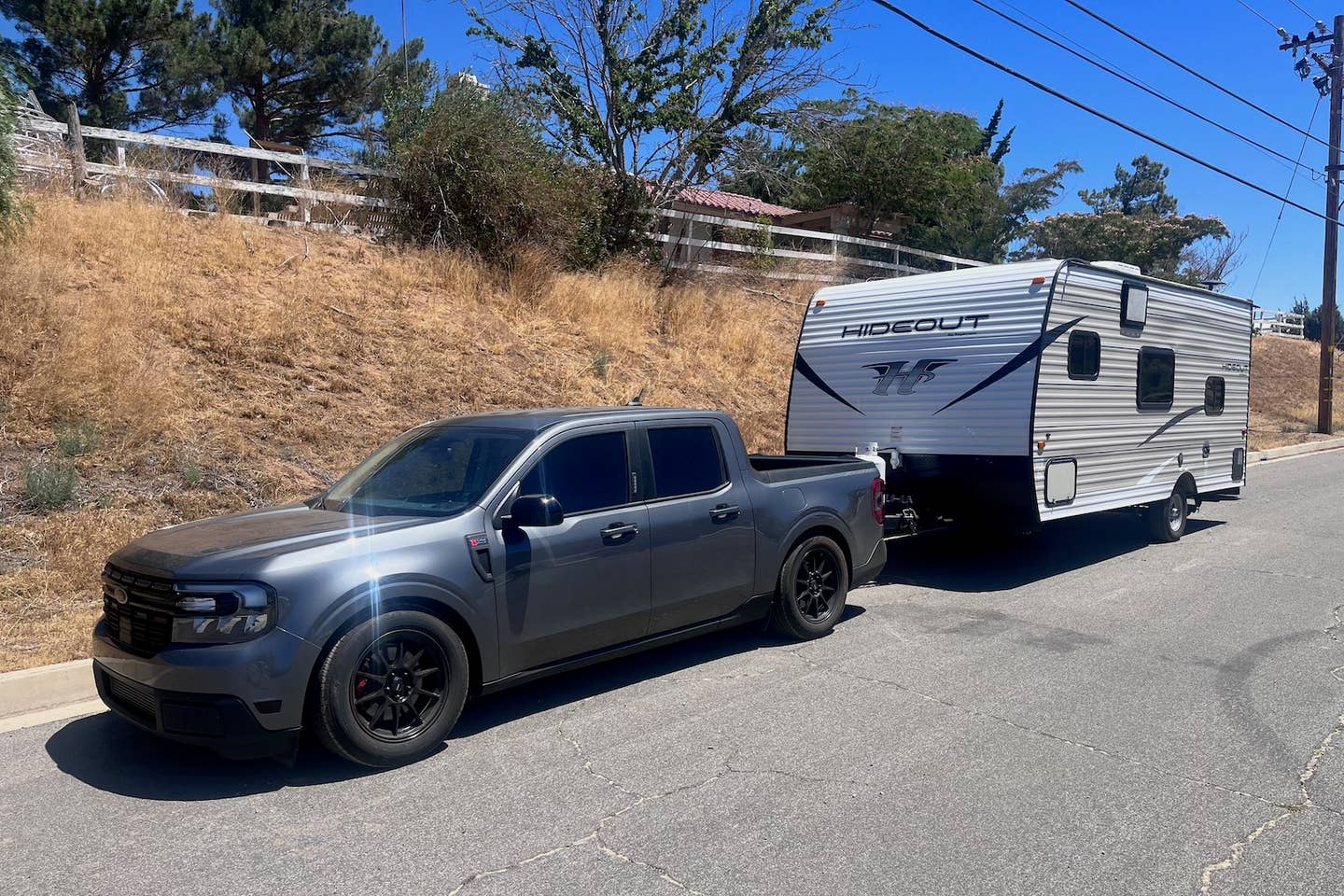 Ivan Gonzalez's 2.3-liter EcoBoost swapped Ford Maverick pulling a camper.