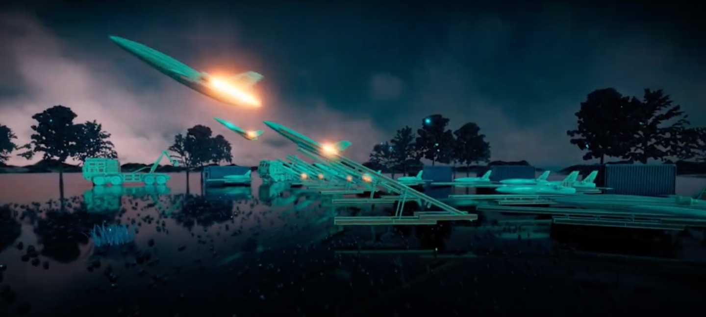 A screencap from a video depicts multiple Jackdaw drones taking off from mobile launchers. <em>QinetiQ</em>