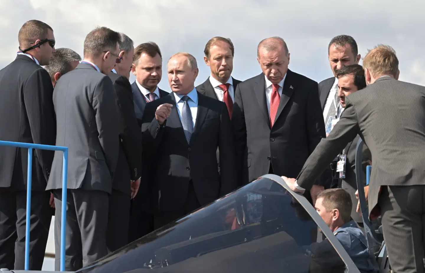 Putin and Turkish President Recep&nbsp;Erdogan examine a Su-57 at the MAKS airshow outside of Moscow in 2019.&nbsp;<em>Sergey Guneev / Sputnik via AP</em>