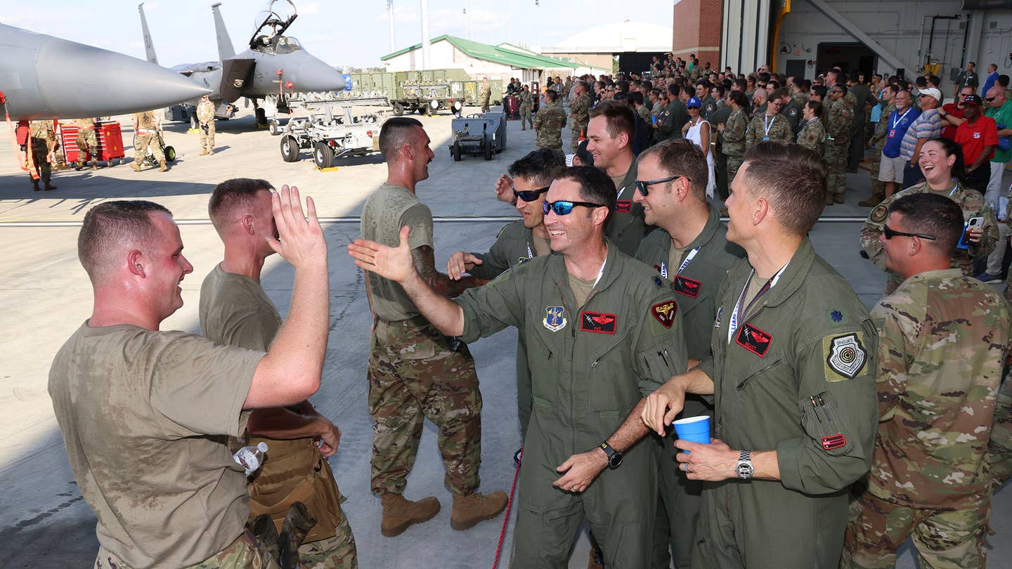 Celebrations as the Massachusetts ANG's 104th FW wins the F-15 weapons load competition. <em>James Deboer</em>