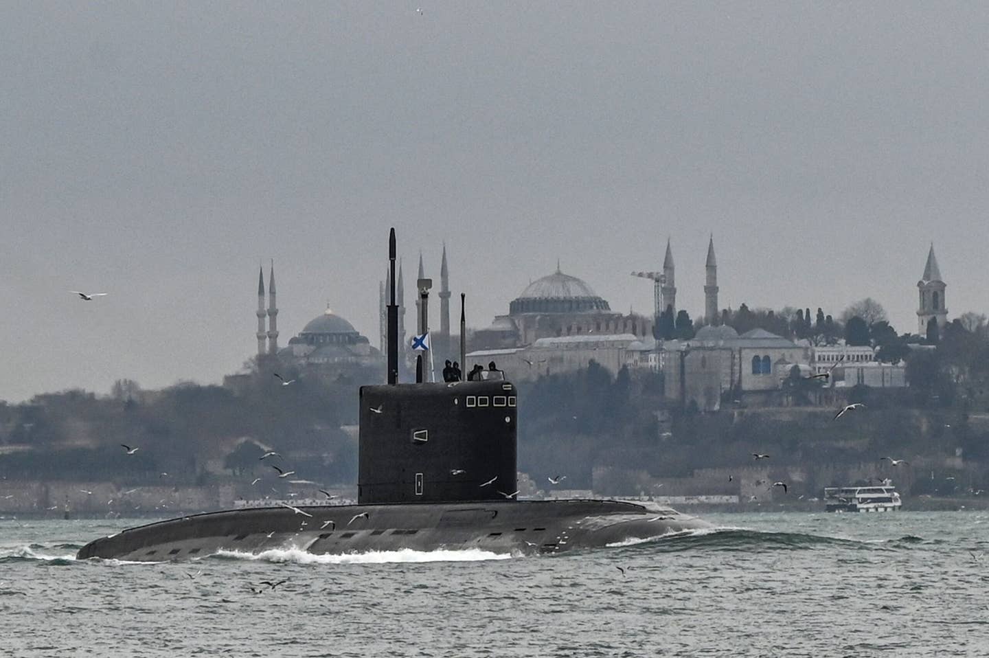 Seen in happier times, the Russian Navy <em>Improved Kilo</em> class submarine <em>Rostov-on-Don</em> sails through the Bosphorus Strait on the way to the Black Sea, on February 13, 2022. <em>Photo by OZAN KOSE/AFP via Getty Images</em>