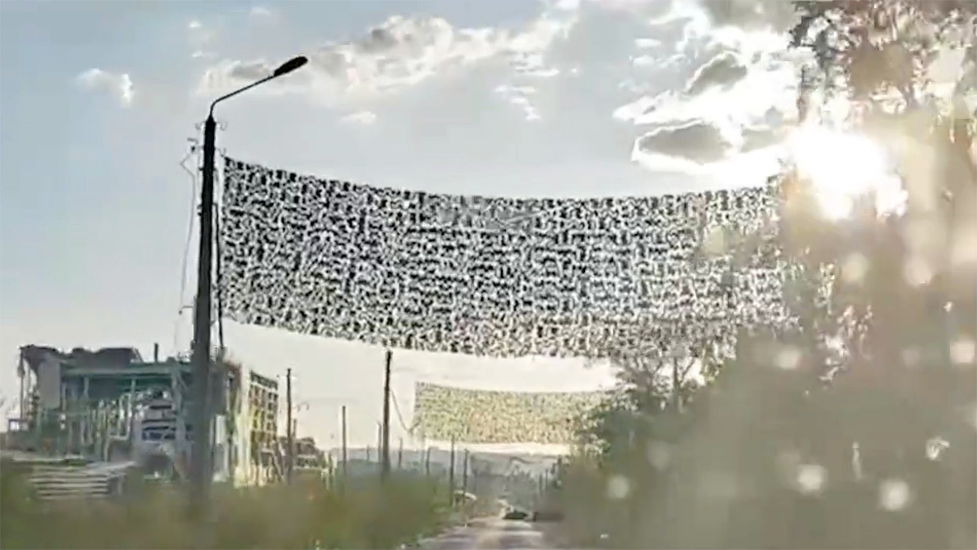 To counter FPV drones, Russia has implemented a strategy of hanging nets between light poles.