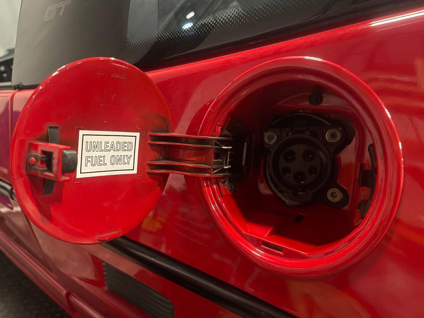 1988 Pontiac Fiero GT EV by Classic EV Conversions. A charge port can be seen inside the gas cap.