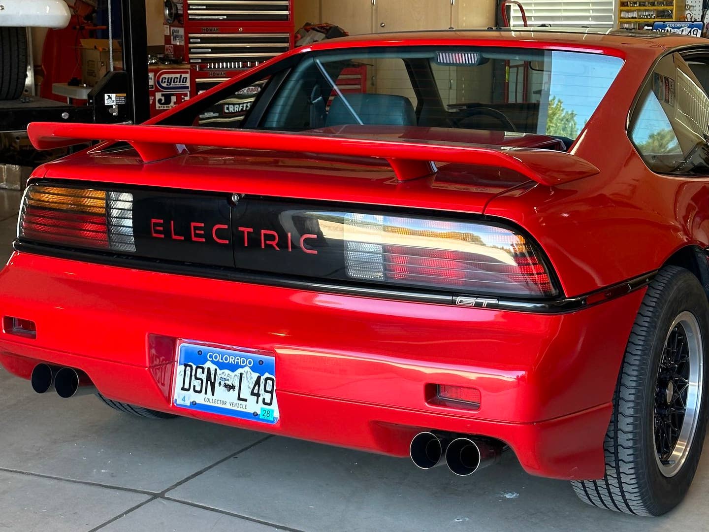 1988 Pontiac Fiero GT EV by Classic EV Conversions. The rear panel says &quot;electric&quot; instead of Pontiac.