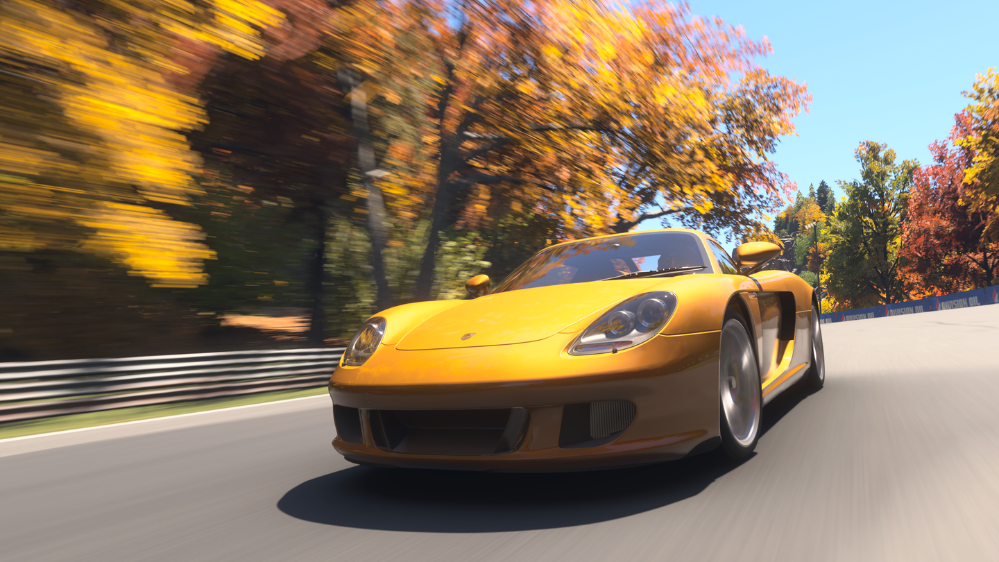 Photo Mode capture from Forza Motorsport of a yellow Porsche Carrera GT at Maple Valley.