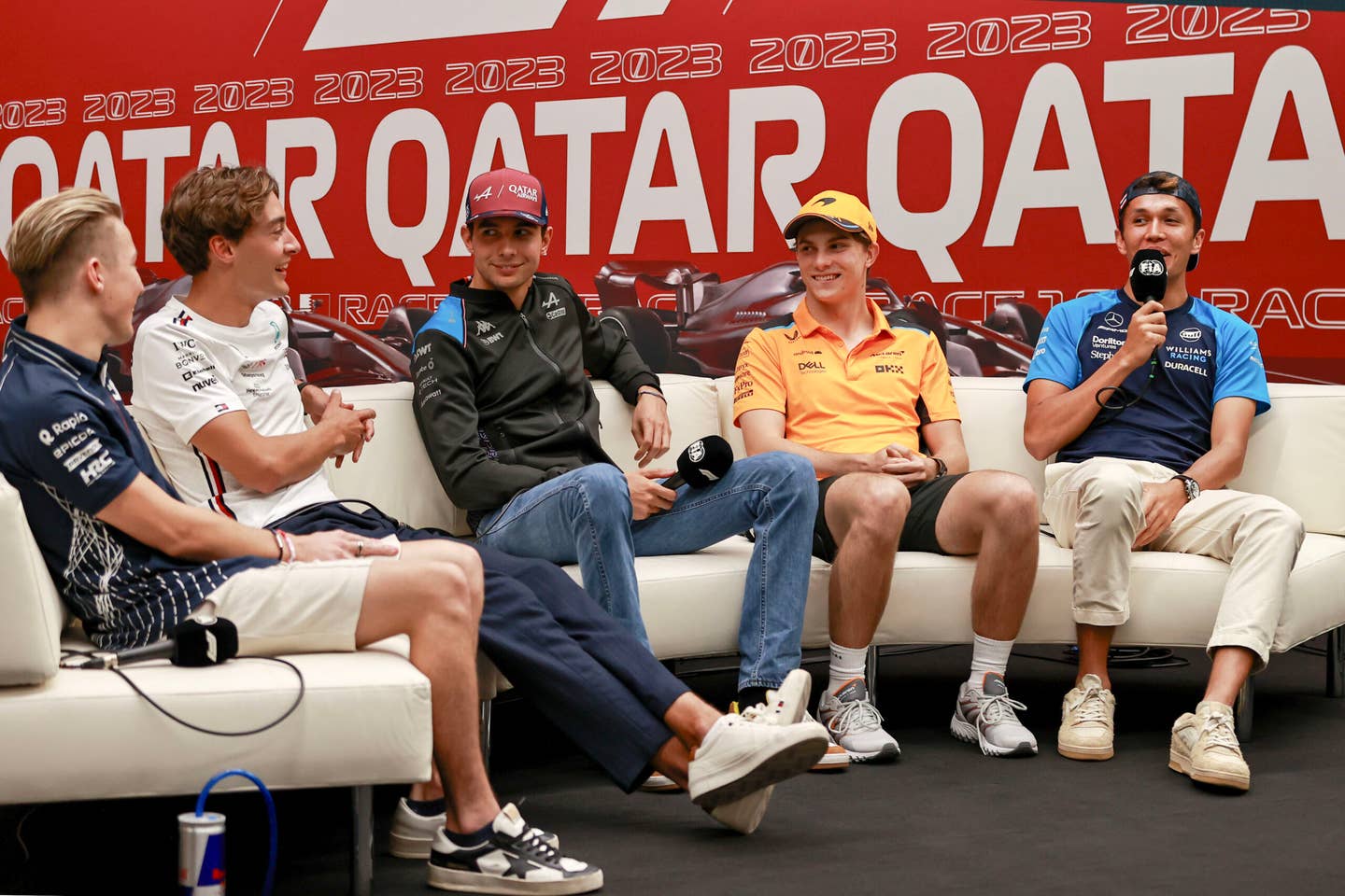 From left to right: F1 drivers Liam Lawson, George Russell, Esteban Ocon, Oscar Piastri, and Alex Albon<em> </em>at the Qatar GP preview. <em>Getty</em>