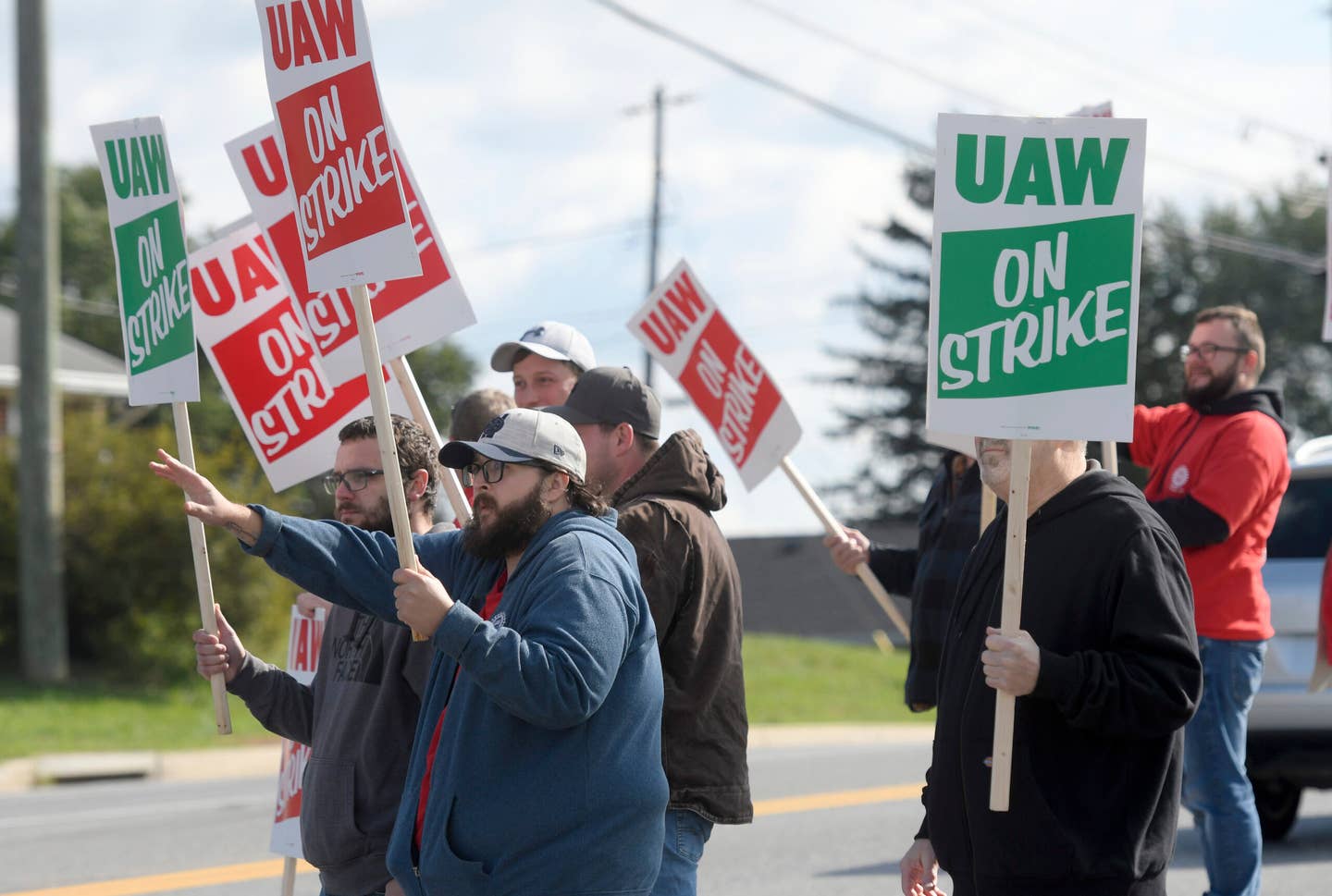 Members of UAW Local 171 picket outside a Mack Trucks facility in Hagerstown, Maryland after going on strike on Monday, Oct. 9.