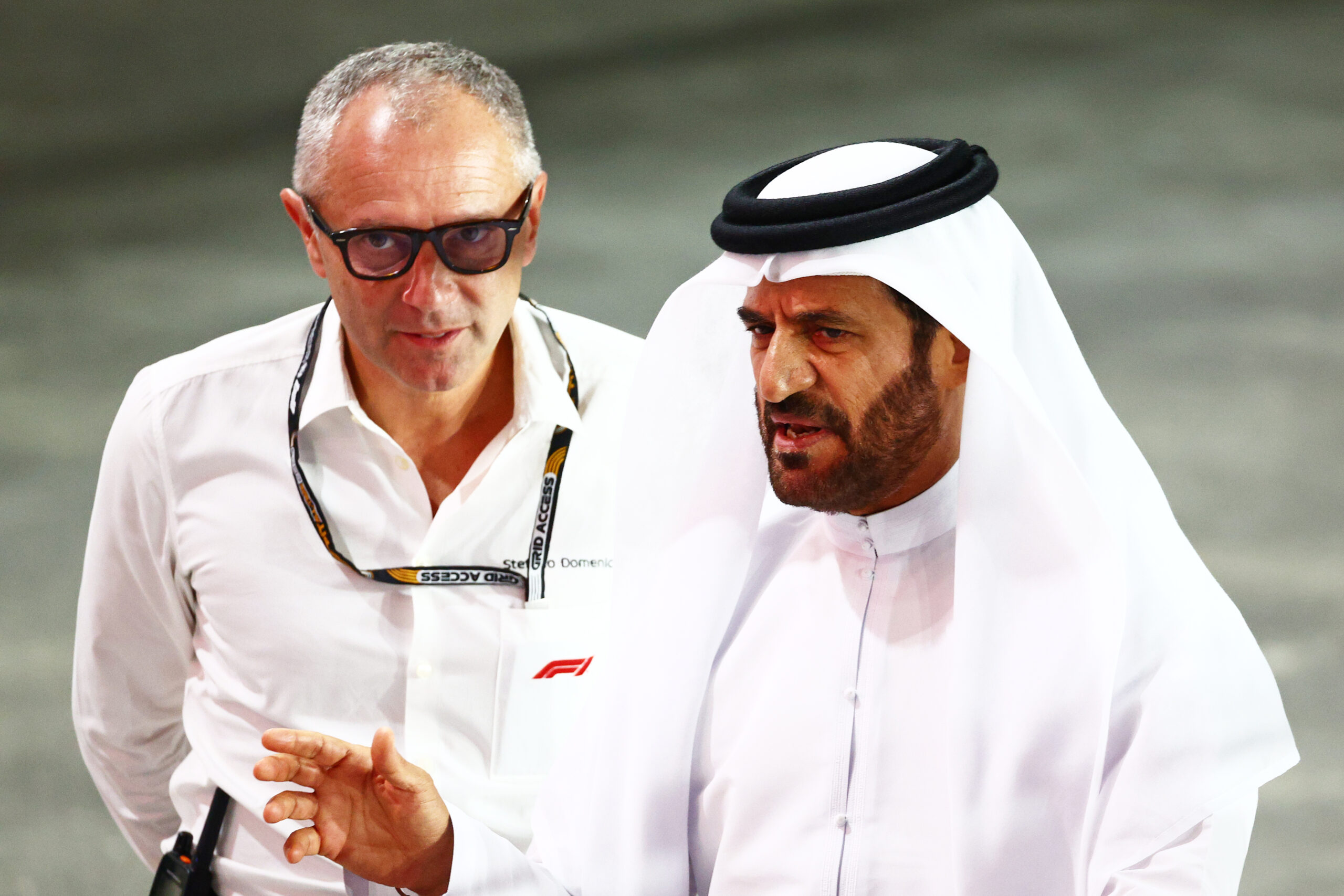 LUSAIL CITY, QATAR - OCTOBER 07: Stefano Domenicali, CEO of the Formula One Group, talks with Mohammed ben Sulayem, FIA President, in parc ferme during the Sprint ahead of the F1 Grand Prix of Qatar at Lusail International Circuit on October 07, 2023 in Lusail City, Qatar. (Photo by Clive Rose/Getty Images)