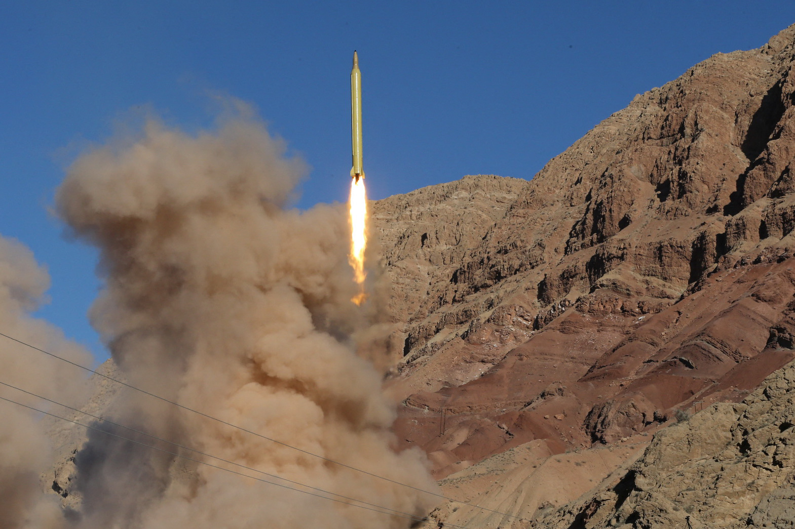 TOPSHOT - A long-range Qadr ballistic missile is launched in the Alborz mountain range in northern Iran on March 9, 2016. Iran said its armed forces had fired two more ballistic missiles as it continued tests in defiance of US warnings. (Photo by Mahmood Hosseini / TASNIM NEWS / AFP) (Photo by MAHMOOD HOSSEINI/TASNIM NEWS/AFP via Getty Images)