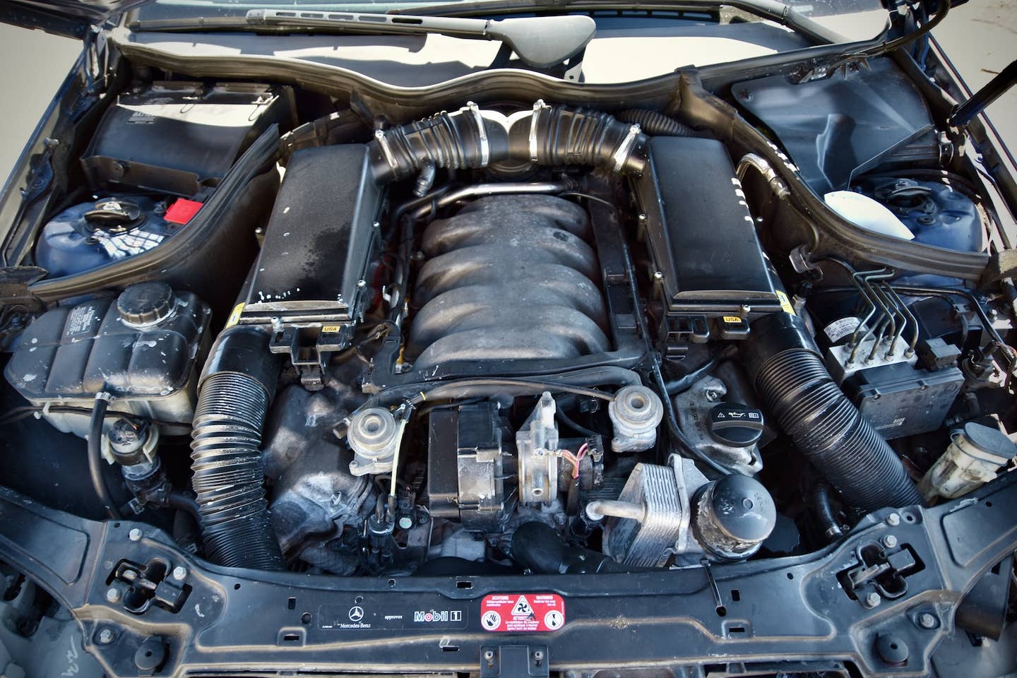 Mercedes M113 5.4-liter V8 in a C320 Sportcoupe engine bay