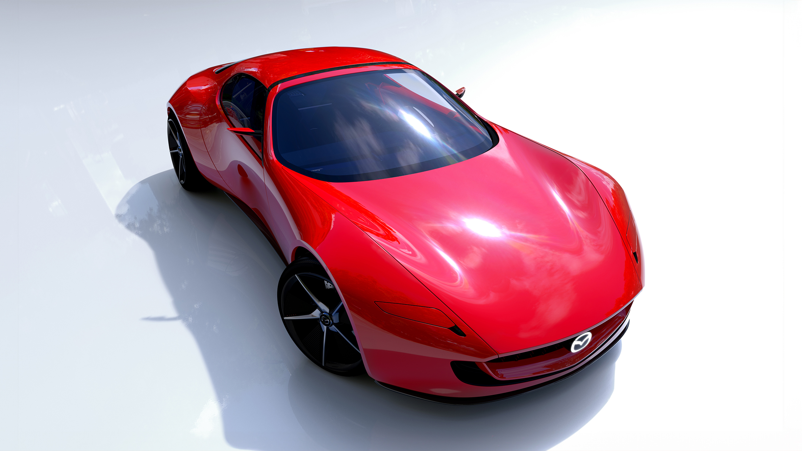 The Mazda Iconic SP Concept is an impressive hybrid sports car featuring a unique rotating design and headlights that pop up.