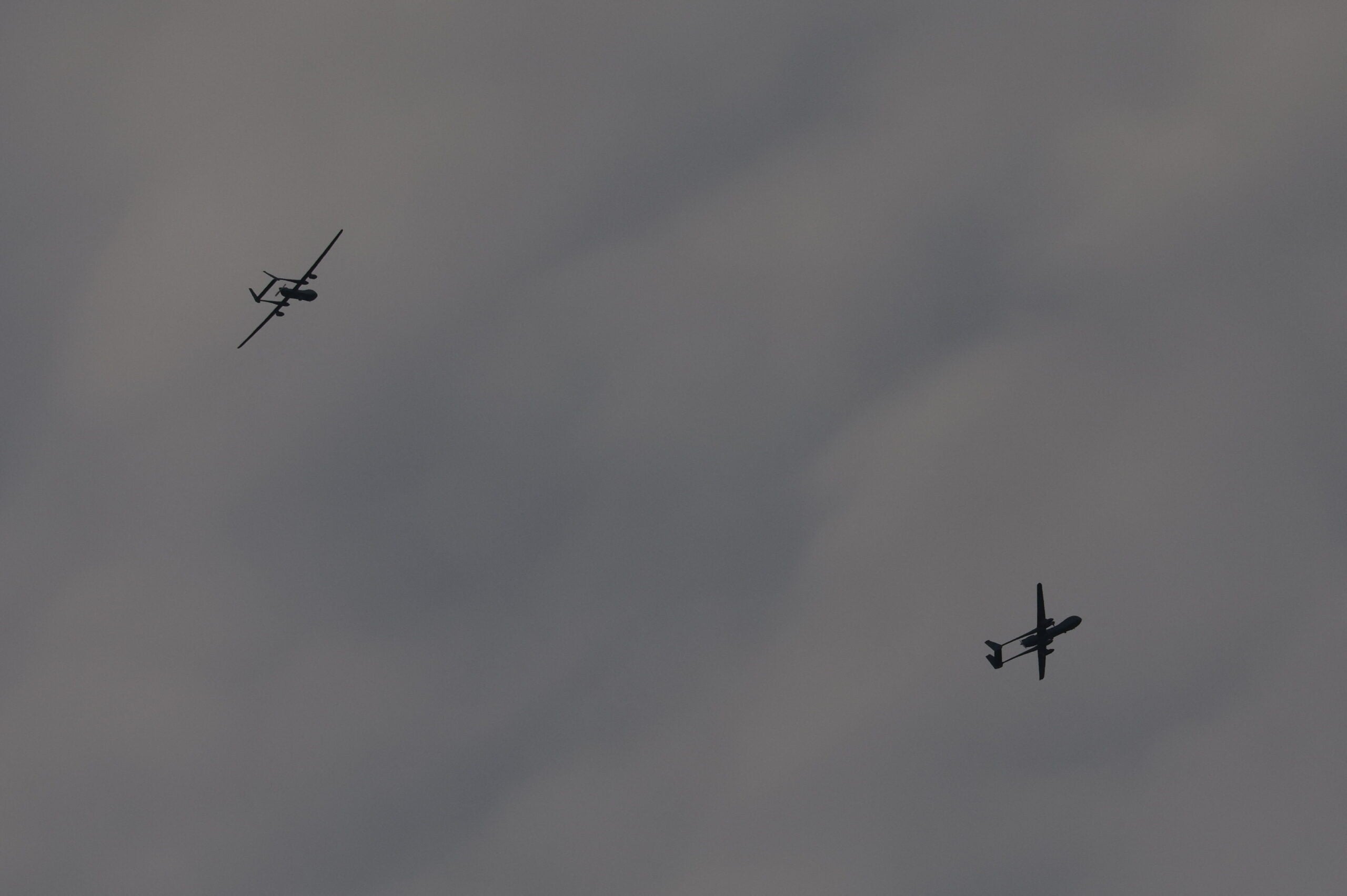 A picture taken from Israel's southern city of Sderot shows Israeli Heron military drones over the northern Gaza Strip, on October 29, 2023, amid ongoing battles between Israel and the Palestinian Hamas movement. (Photo by JACK GUEZ / AFP) (Photo by JACK GUEZ/AFP via Getty Images)