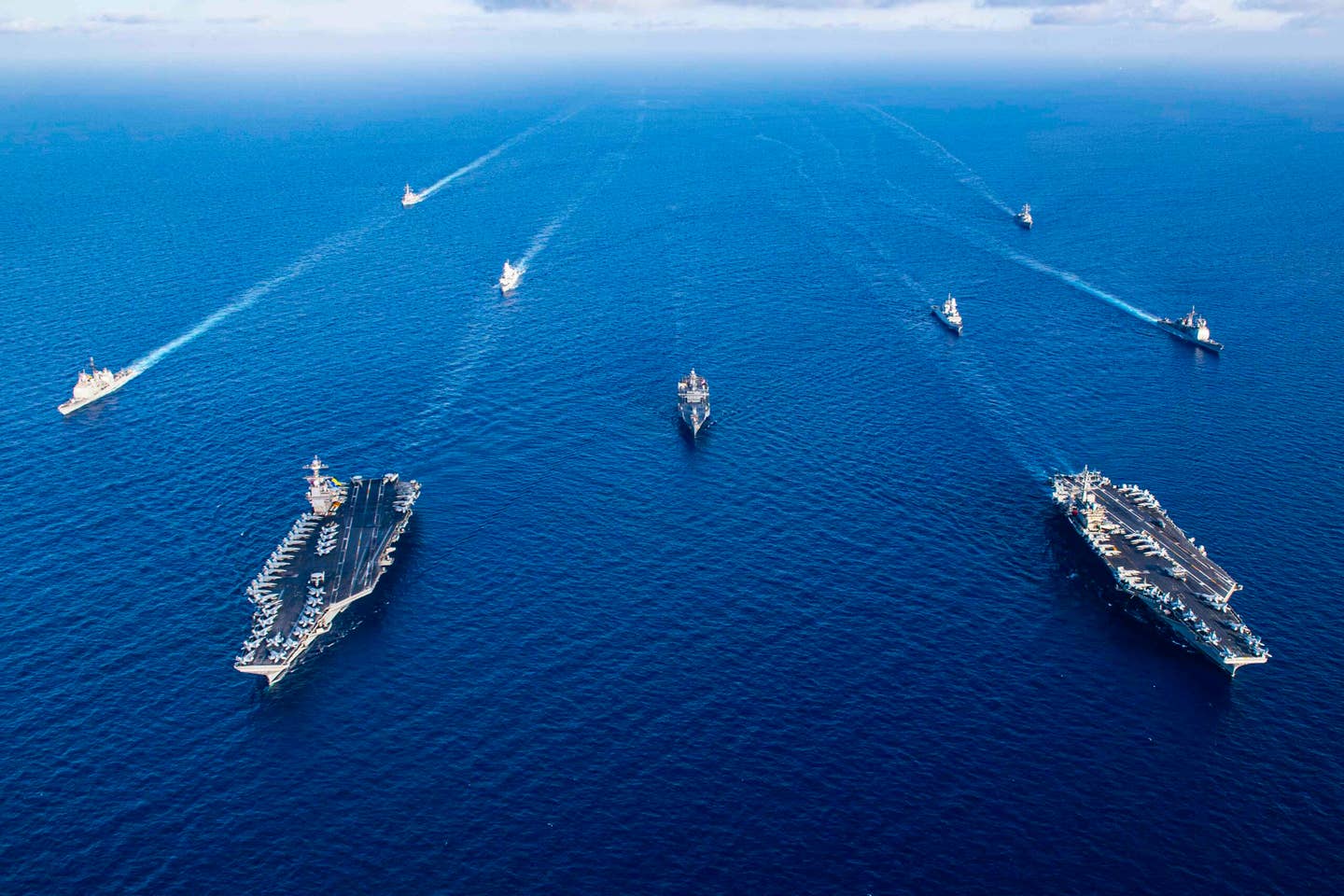 Ships from the <em>Gerald R. Ford</em> and <em>Dwight D. Eisenhower</em> Carrier Strike Groups (CSG), U.S. Sixth Fleet command ship <em>USS Mount Whitney</em> (LCC 20), and Italian Navy frigates <em>Carlo Margottini</em> (F 592) and <em>Virginio Fasan</em> (F 591) sail in formation in the Mediterranean Sea, Nov. 3, 2023. (U.S. Navy photo by Mass Communication Specialist 3rd Class Janae Chambers)