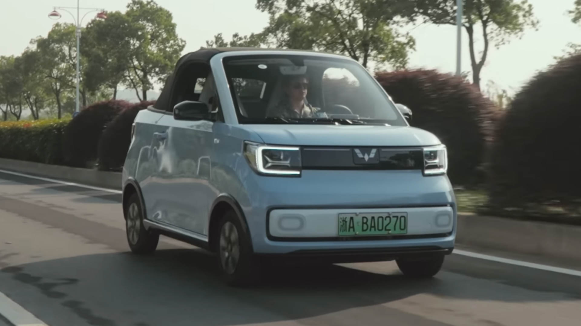 The World's Cheapest Convertible EV Is as Terrible as It Is Adorable