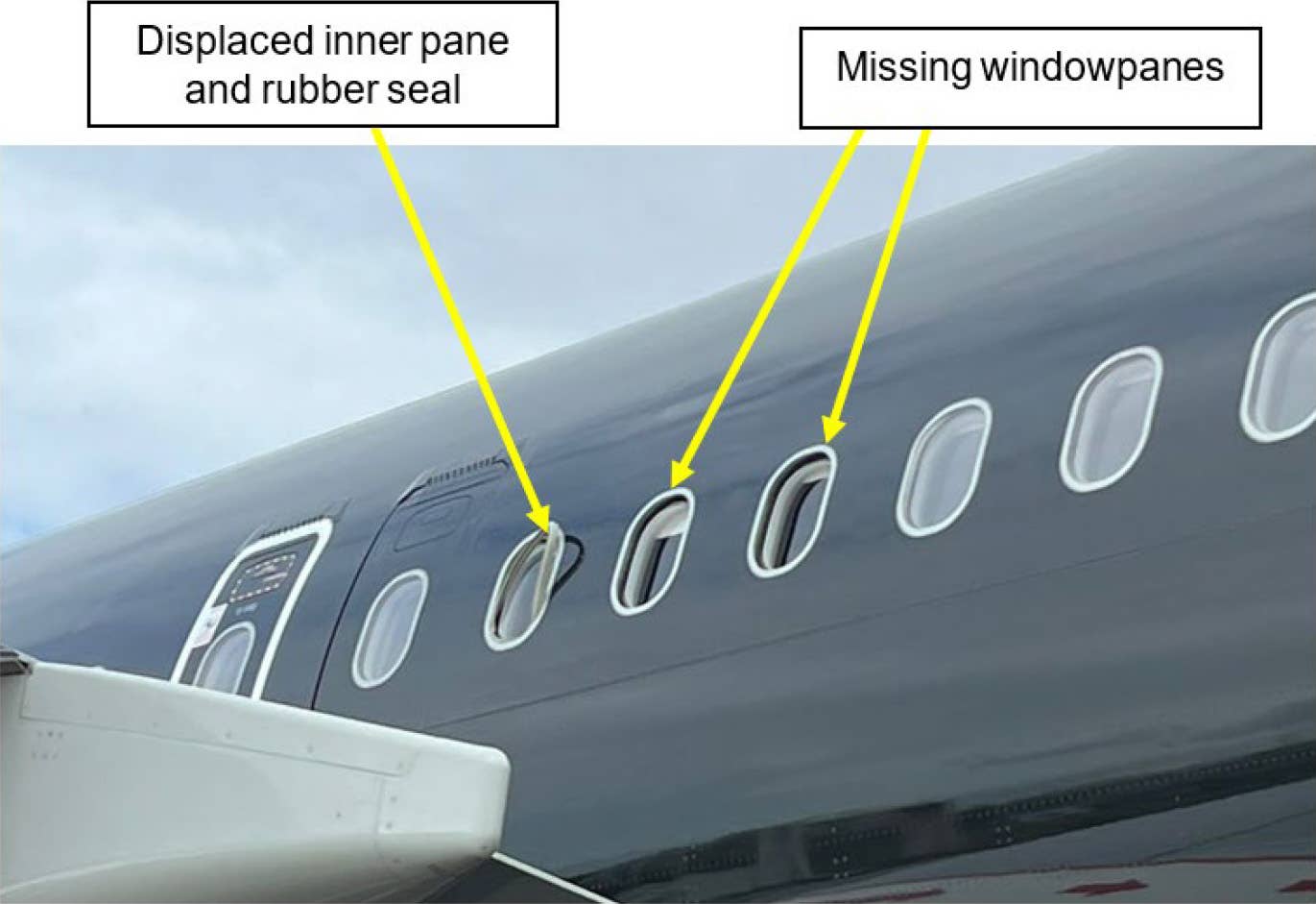 Image showing three damaged windows missing outer panes on the affected airliner