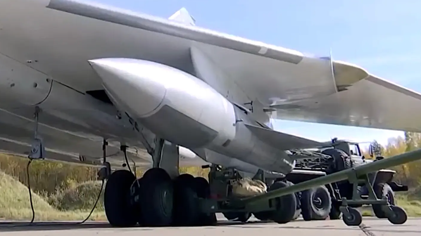 A Kh-22 series supersonic cruise missile under the wing of a Tu-22M3 bomber. <em>Russian Ministry of Defense screencap</em>