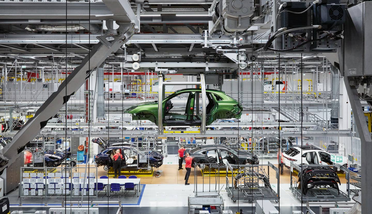 A shot of Porsche's Leipzig facility, which also builds the Macan. Leipzig's a great town and if you're planning a trip, <a href="https://shop.porsche-leipzig.com/en/tour" target="_blank" rel="noreferrer noopener nofollow">you can take a Porsche factory tour too</a>! <em>Porsche</em>