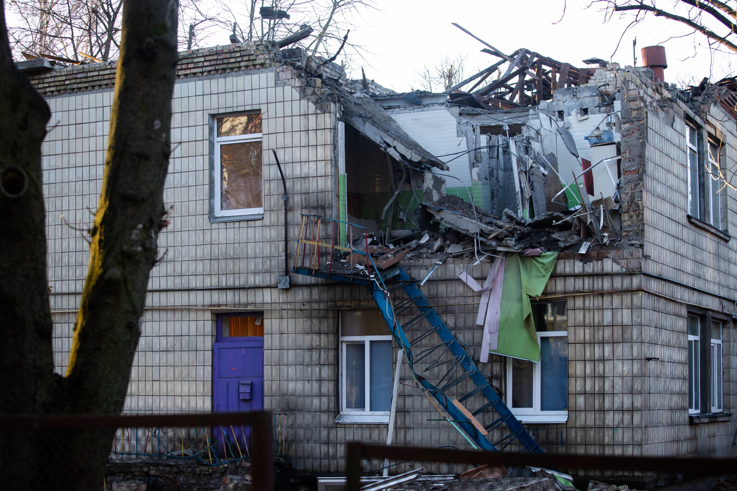 KYIV, UKRAINE - NOVEMBER 25: A building of a preschool in Solomianskyi district lies partially destroyed by a drone fragment on November 25, 2023 in Kyiv, Ukraine. A new mass drone attack of Russian forces on the Ukrainian capital resulted in injuries to residents of Kyiv and damage to the city's civilian infrastructure. At least six dozen air targets were intercepted by Ukrainian Air Defense Forces. (Photo by Yevhenii Zavhorodnii /Global Images Ukraine via Getty Images)