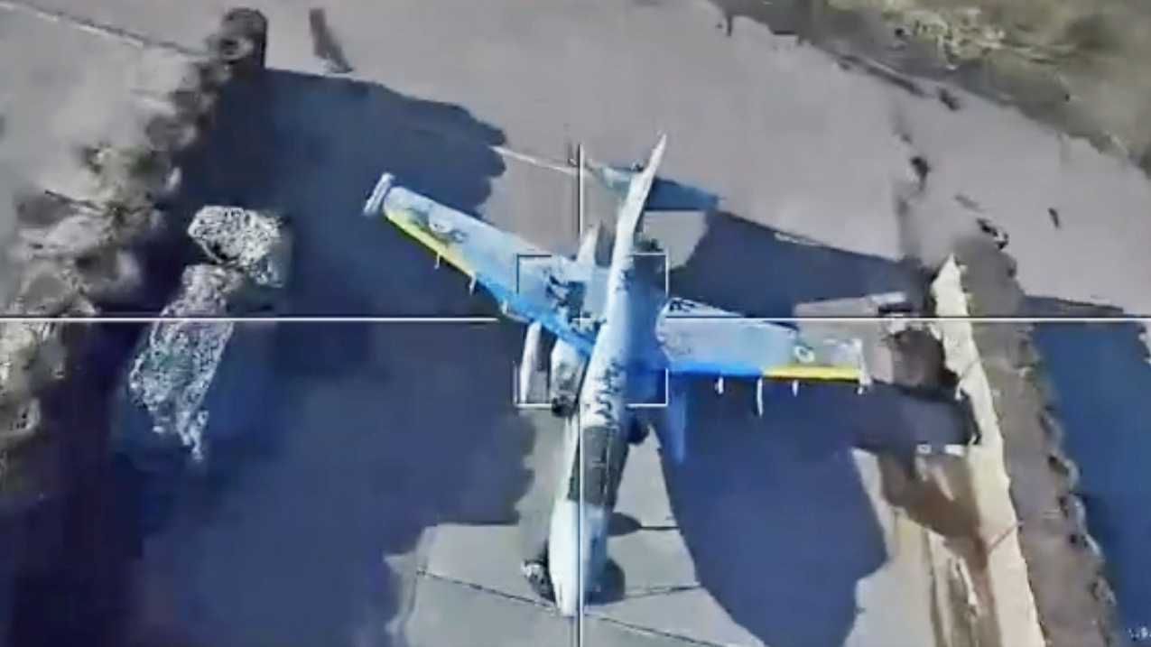 Ukrainian Su-25 Struck By Lancet Drone Was An Elaborate Decoy View of Su-25 attack jet decoy soon through optics of a Lancet loitering munition.