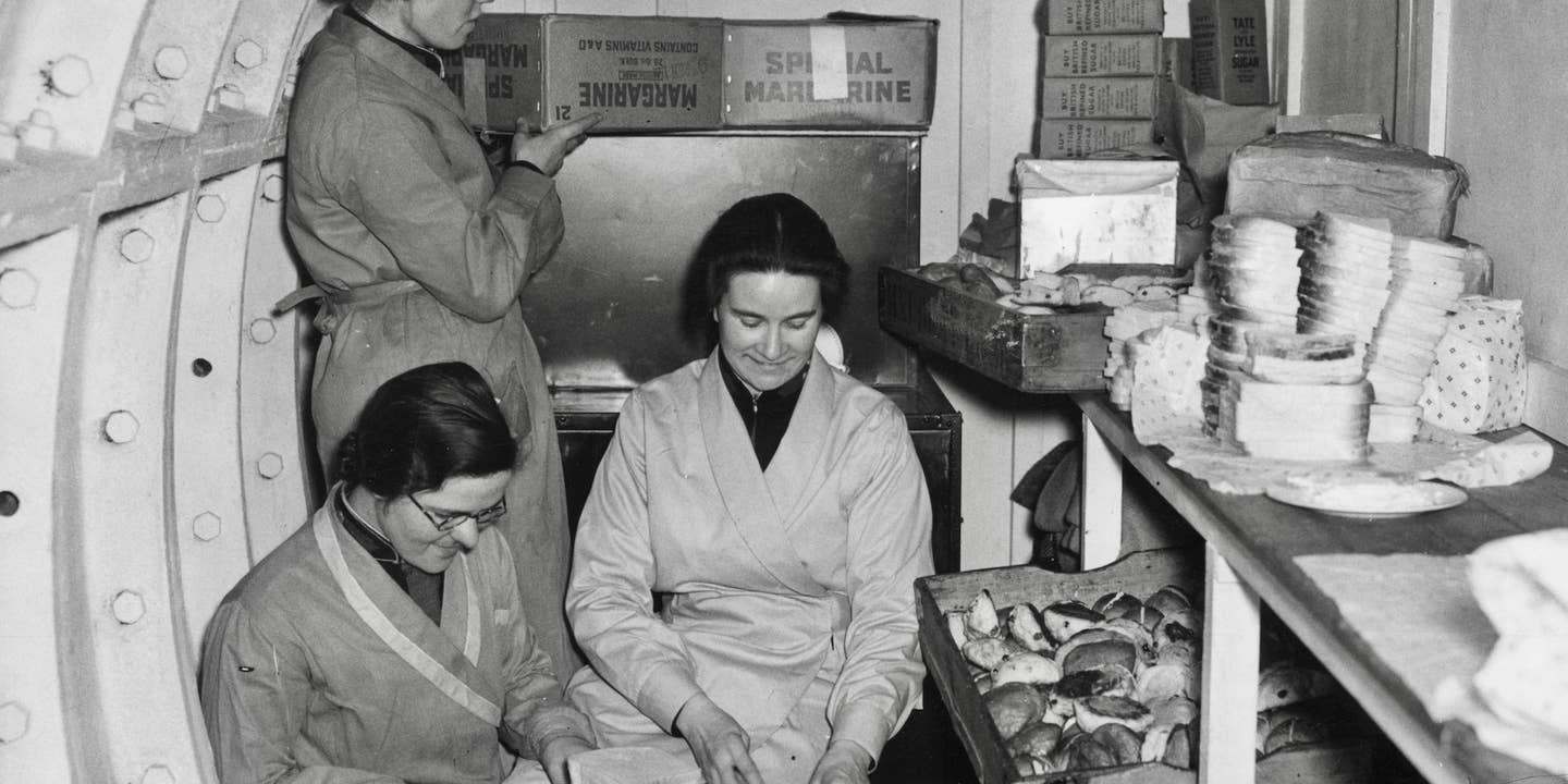 27th February 1941: Catering staff preparing sandwiches for the air raid shelters in London. (Photo by Reg Speller/Fox Photos/Getty Images)