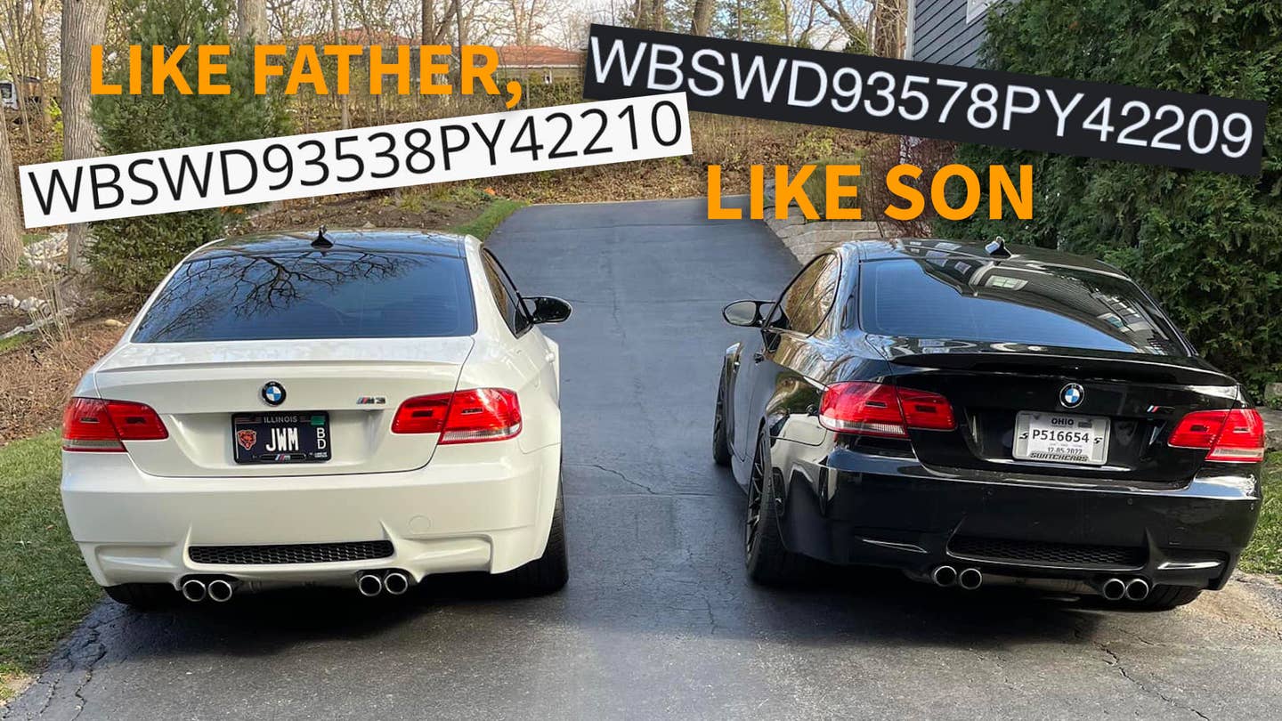 A black and white BMW M3 sit side-by-side in a driveway