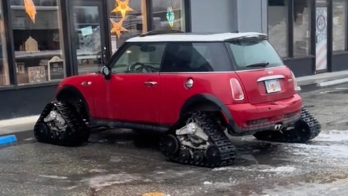 The Alaskan R53 Mini Cooper S equipped with tank tracks takes the victory in the winter season.