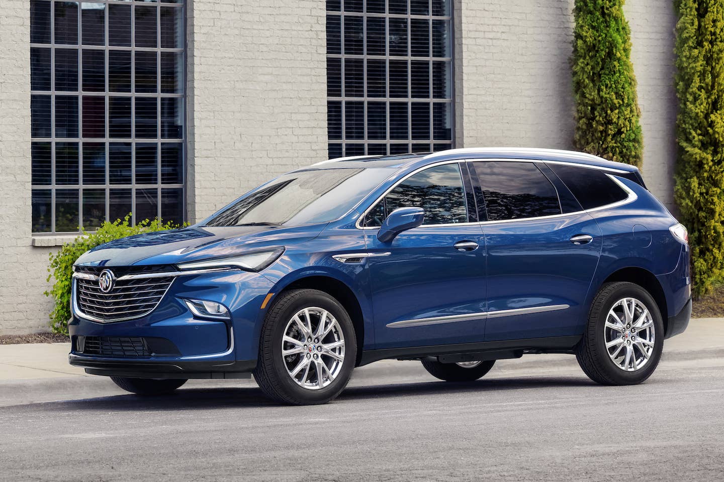 A front 3/4 view of the 2024 Buick Enclave Premium in Emperor Blue Metallic.