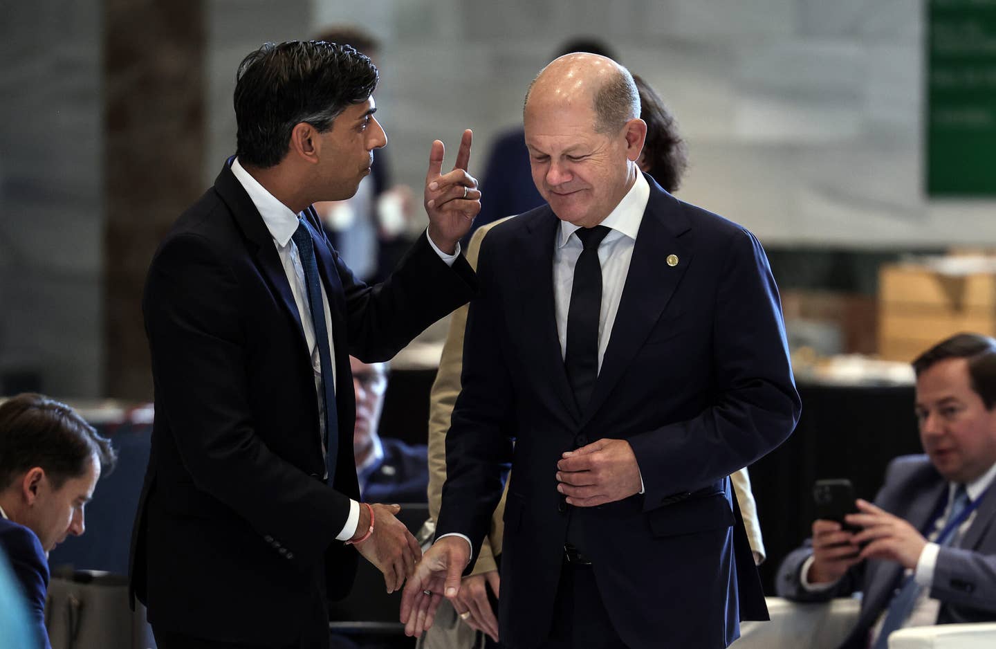 German Chancellor Olaf Scholz (right) and British Prime Minister Rishi Sunak arrive for a bilateral meeting during the European Political Community summit in Granada, Spain, in October 2023. <em>Photo by Thomas Coex — Pool/Getty Images</em>