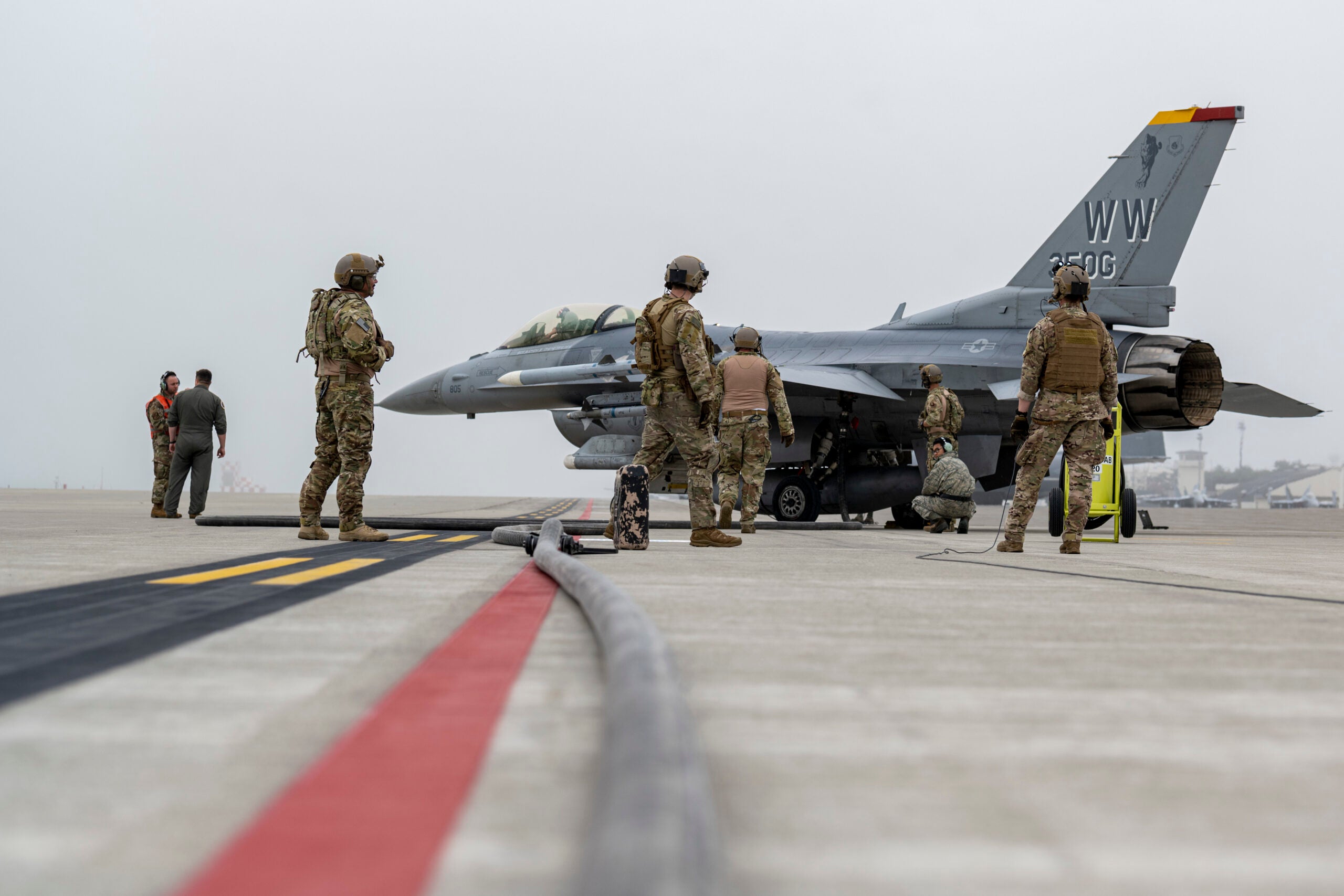 U.S. Airmen from the 18th Logistic Readiness Squadron and 1st Special Operations Squadron from Kadena Air Base, Japan, refuel an F-16 Fighting Falcon during a forward area refueling point training at Misawa Air Base, Japan, June 25, 2020. When a fighter squadron has FARP support, options are vastly increased, as any accessible airfield or island can be used to replenish fighters and send them back to the fight. (U.S. Air Force photo by Staff Sgt. Melanie A. Bulow-Gonterman)