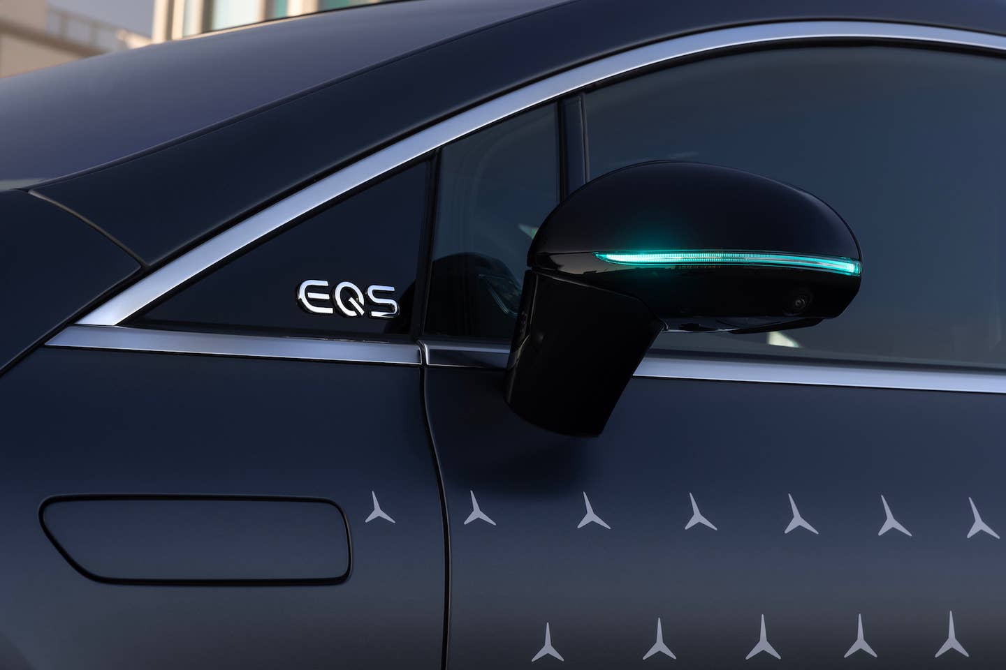 Turquoise lighting elements in a Mercedes-Benz EQS