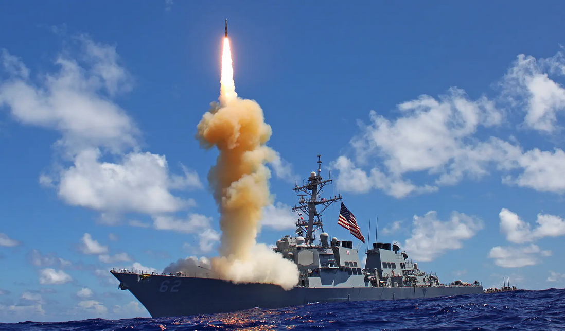 A U.S. Navy destroyer fires as Standard missile. (USN)