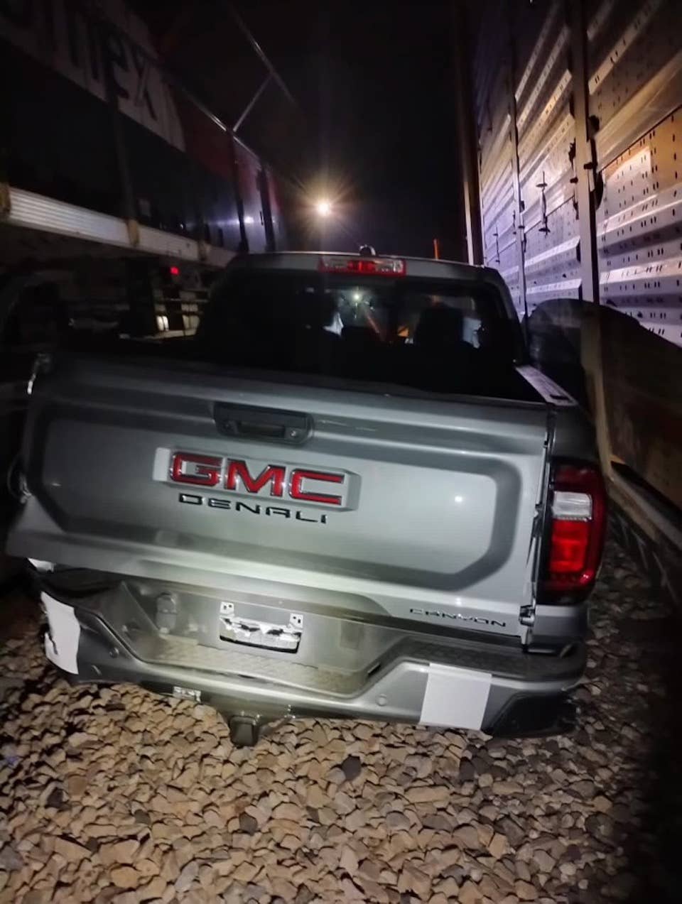 2024 GMC Canyon Denali damaged in a theft that resulted in a collision with a train