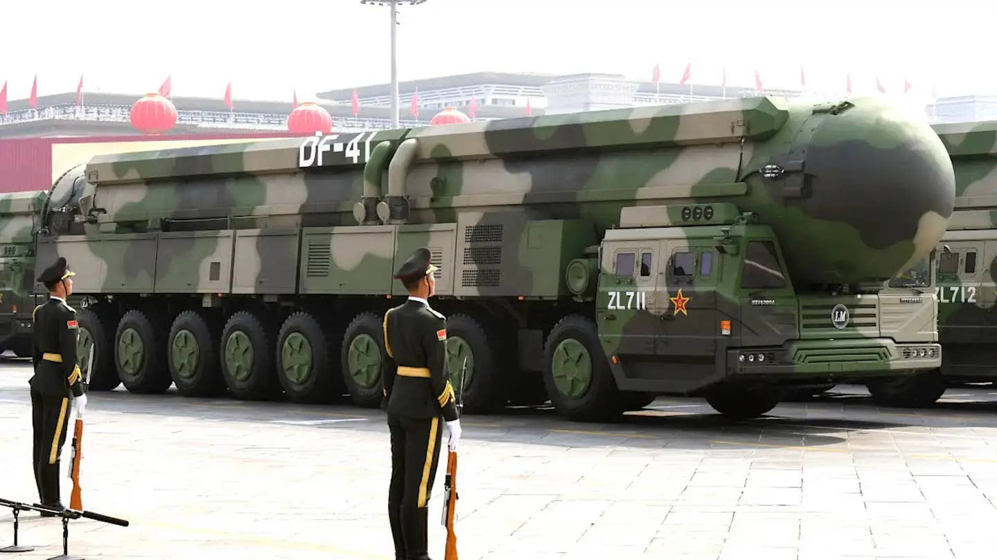 Chinese road-mobile DF-41 intercontinental ballistic missiles (ICBM) on parade.<em> Kyodo via AP</em>