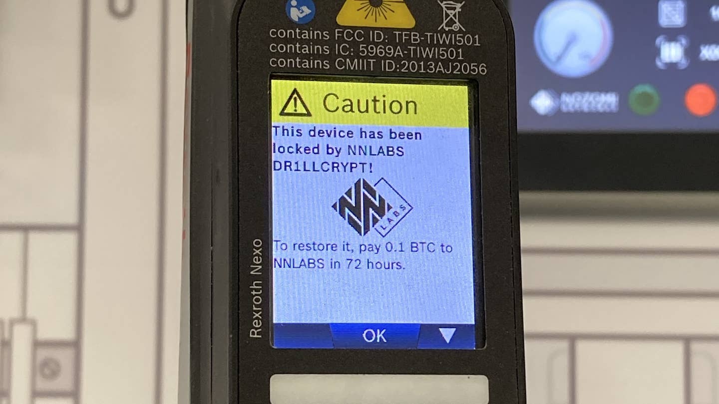 A hacked Bosch smart wrench displays a mockup of Ransomware to illustrate a security weakness