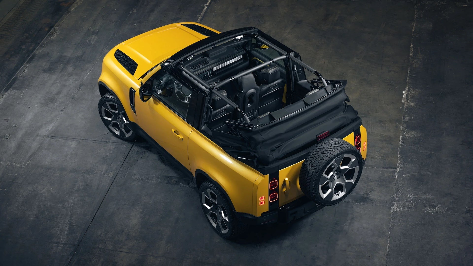 The Land Rover Defender now comes with an electric convertible roof, specifically designed for optimal performance in rugged off-road conditions.
