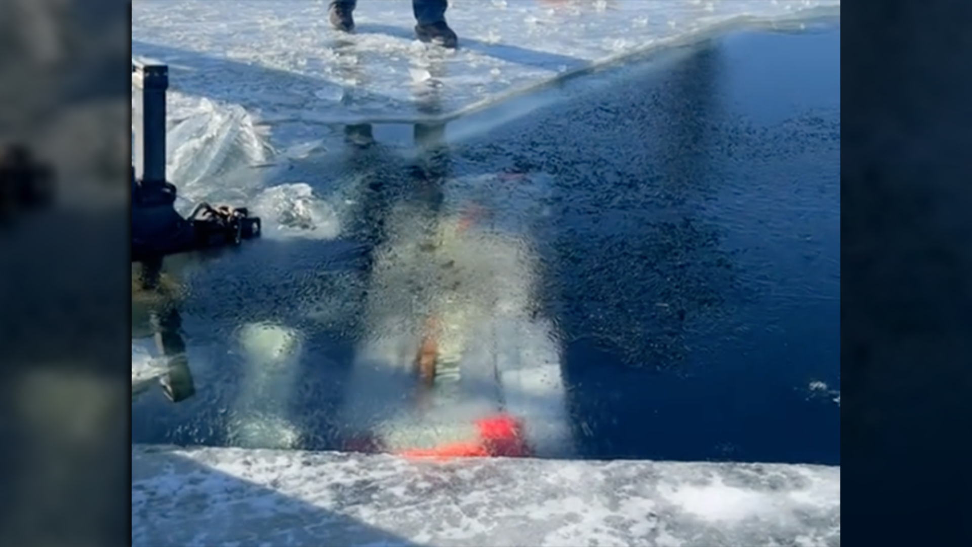 Sunken Ford Super Duty Dives 22 Feet Into Frozen Lake With Trailer Attached