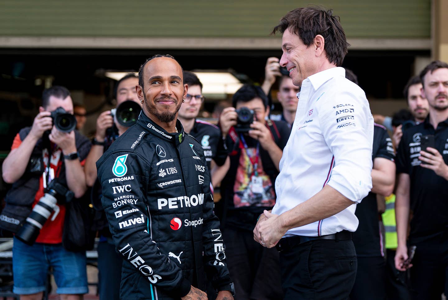 Lewis Hamilton, left, and Mercedes-AMG F1 Team Principal and CEO Toto Wolff.