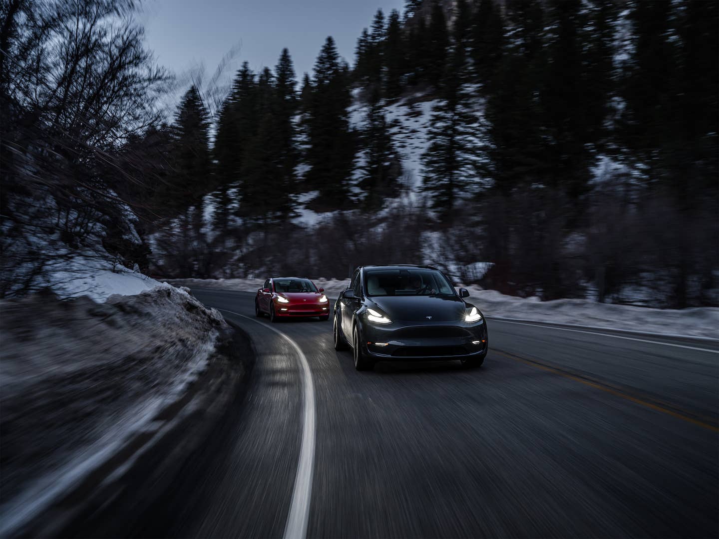 Teslas on a mountain road