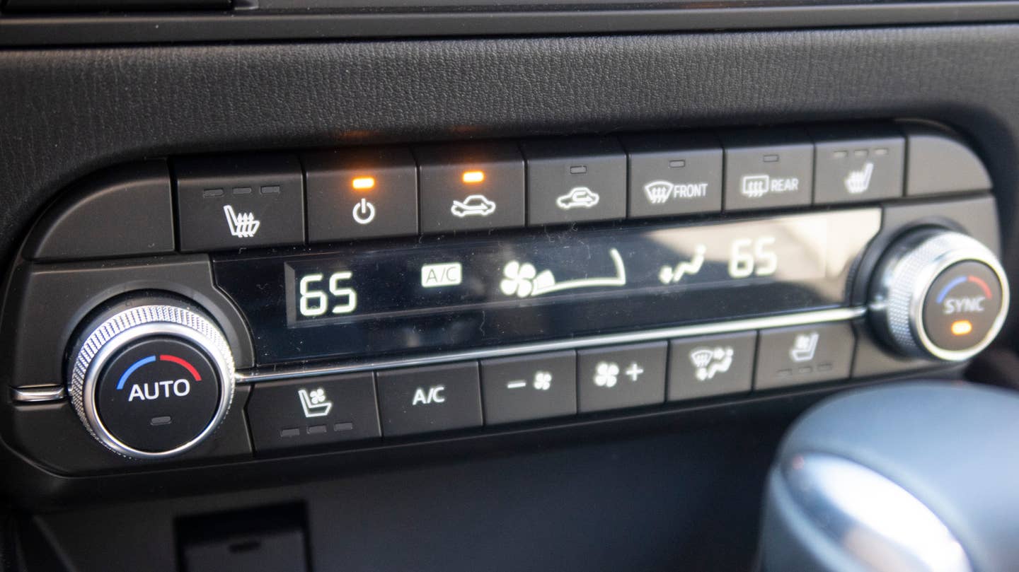 This straightforward climate control console was a welcome reprieve from some of the convoluted screen-based systems I've dealt with lately. <em>Andrew P. Collins</em>