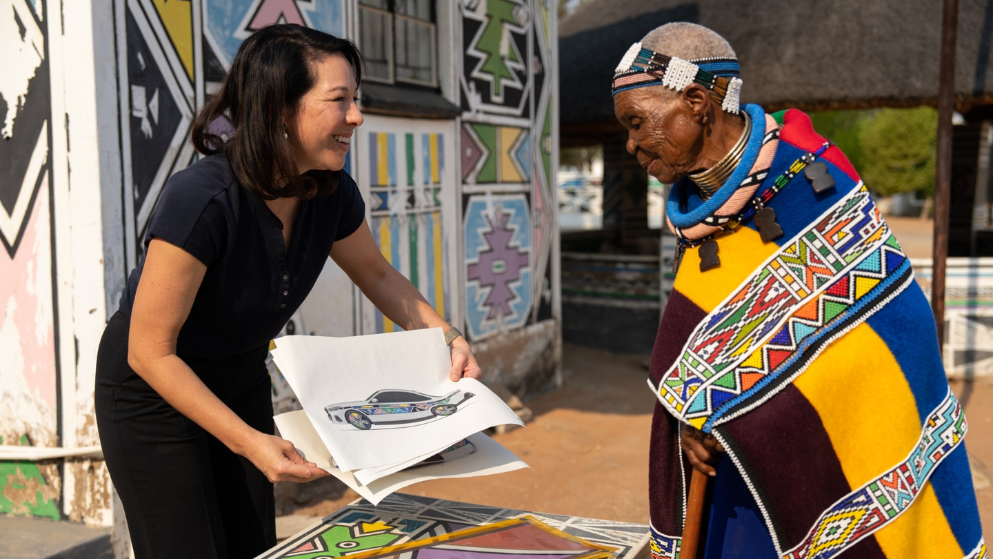 Artist Esther Mahlangu meets with BMW engineer Stella Clarke.