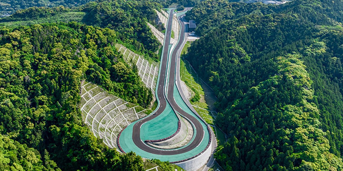 green racetrack in mountains