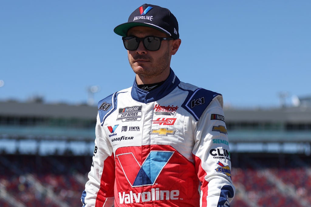 AVONDALE, ARIZONA - MARCH 09: Kyle Larson, driver of the #5 Valvoline Chevrolet, walks the grid during qualifying for the NASCAR Cup Series Shriners Children's 500 at Phoenix Raceway on March 09, 2024 in Avondale, Arizona. (Photo by Meg Oliphant/Getty Images)