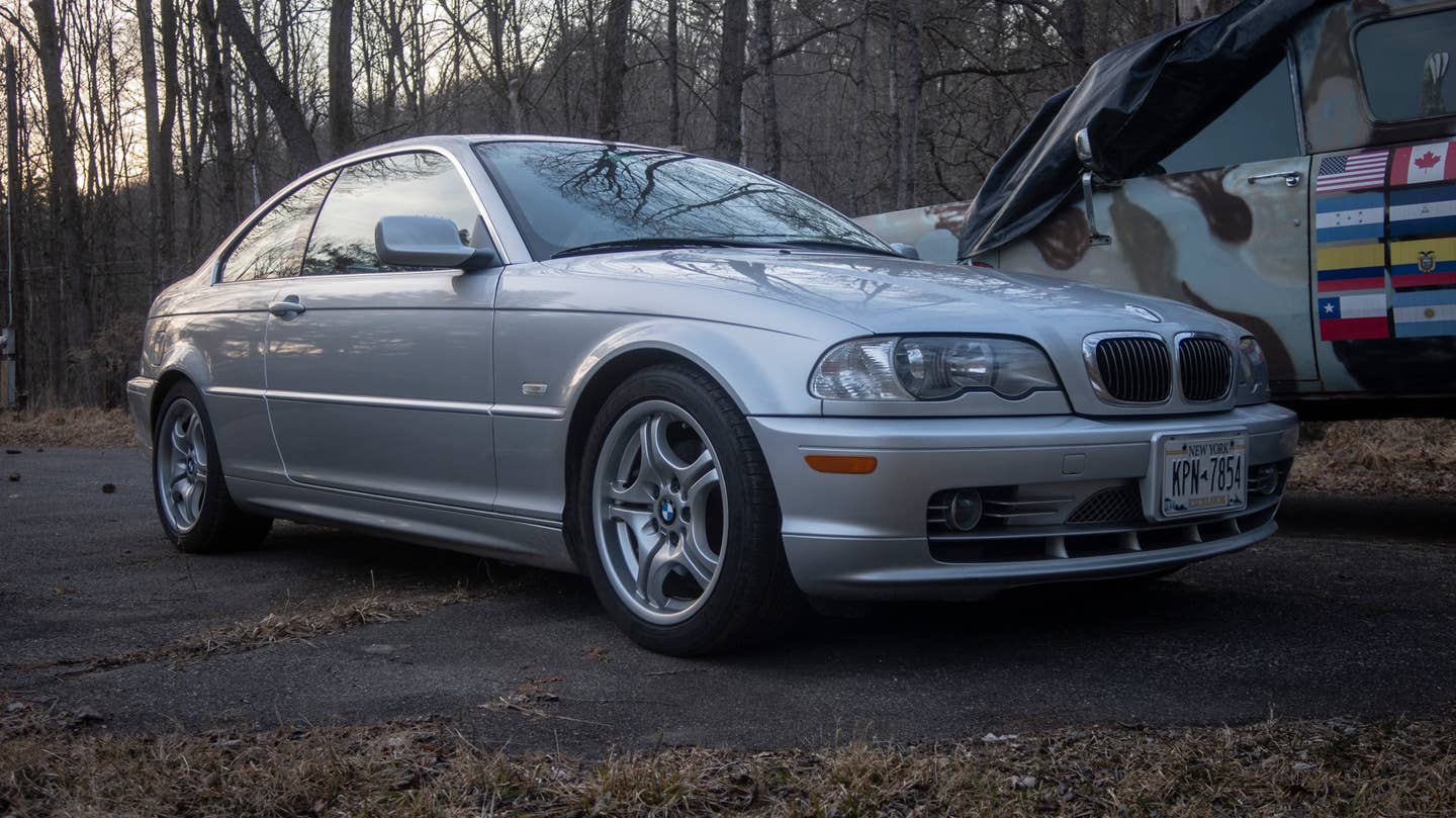 This is a 2003 BMW 330ci (so, pre-facelift) with a ZSP sport package and "Titanium" trim. The sport pack included suspension, seats, clear-corner headlights, and those Style 68 staggered wheels. The chrome trim on the front bumper is unique to this decorative trim level. It's an elegant car, though I still think there's way too many lines and shapes in the front bumper below the kidney grilles. <em>Andrew P. Collins</em>